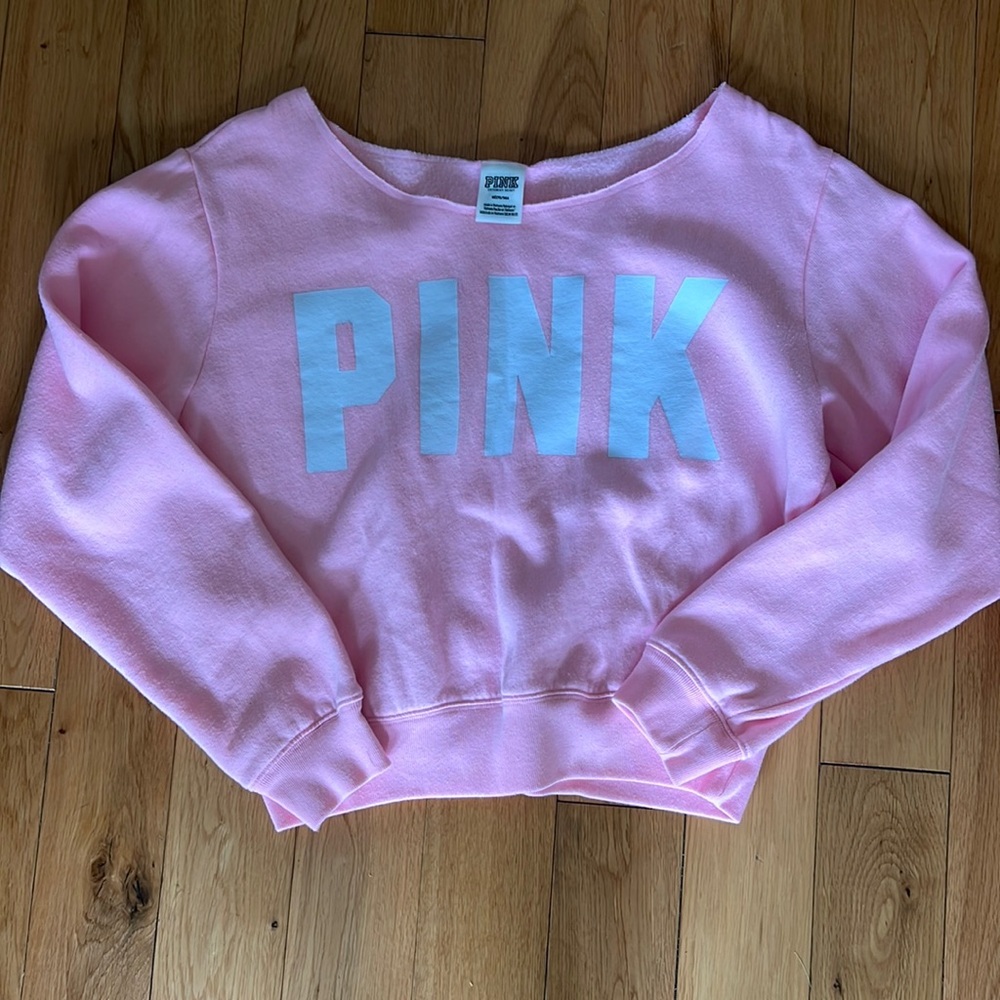 Pink sweatsuit. Shirt is a medium and Pants are a large.